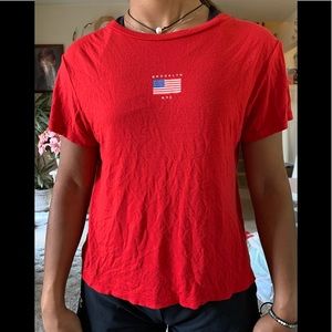 red t-shirt w american flag on it